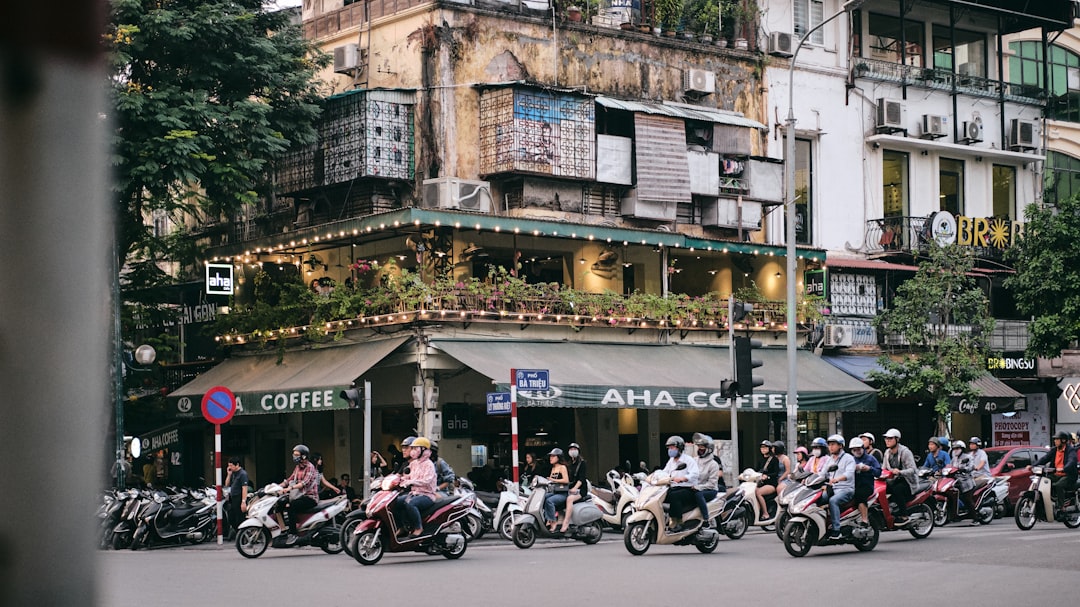 Motorbike rental in Hanoi with a scooter on a Hanoi street